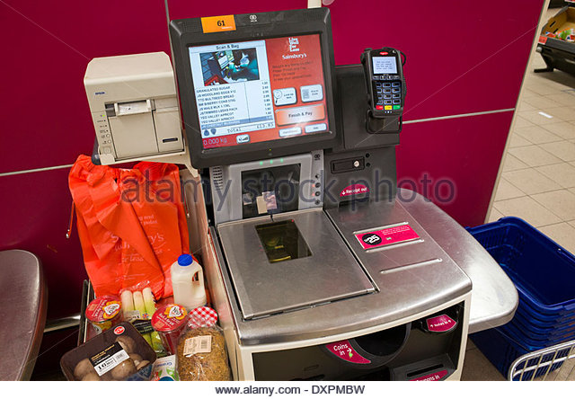 self-checkout-machine-in-sainsburys-supermarket-england-uk-dxpmbw